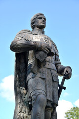 Fototapeta na wymiar BALTIYSK, RUSSIA . Sculpture of Prince Alexander Nevsky against a blue sky. Kaliningrad region