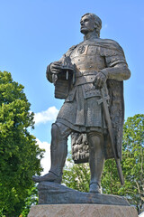 Fototapeta na wymiar BALTIYSK, RUSSIA. Monument to Prince Alexander Nevsky against the background of a blue sky. Kaliningrad region