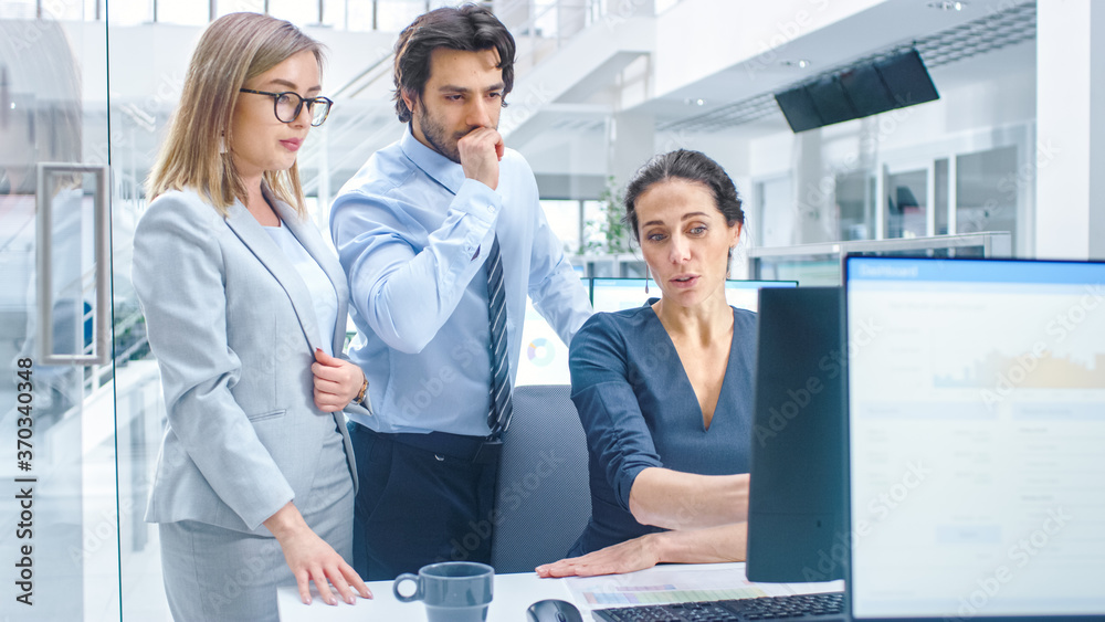 Aufkleber In Bright Modern Office: Office Worker Sitting and Working at Her Desktop Computer, Discusses Problem Solution with Her Project Manager and Team Leader. Young Businessmen Planning and Problem Solving