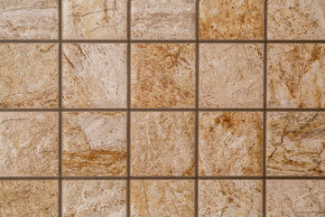 Brown marble stone tiles background, textures with natural pattern, Decorative orange mixed stone mosaic with streaks, floor or wall tile design for interior and exterior, vintage rock texture