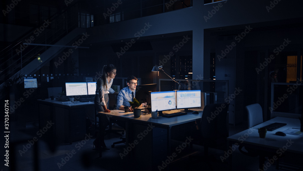 Poster ambitious and confident businessman uses desktop computer, his female project manager explains speci