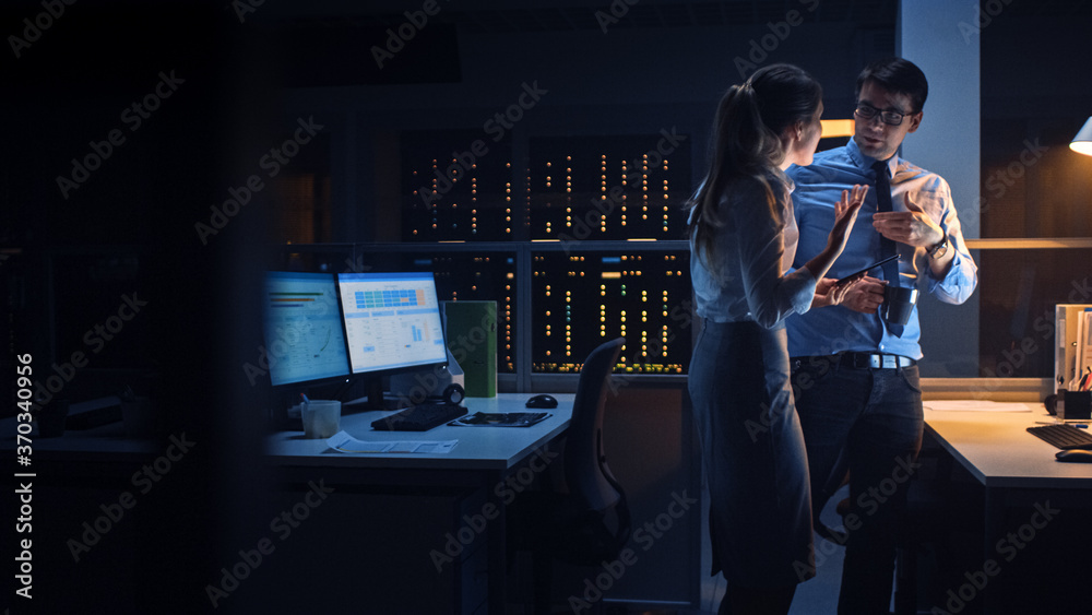 Poster portrait of businessman and female project manager talking and discussing project, account handling 