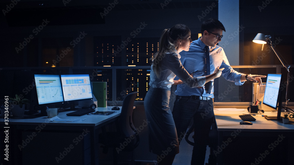 Poster portrait of businessman and female project manager talking and discussing project, account handling 