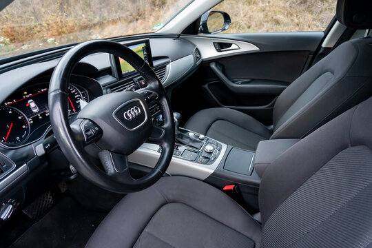 Cluj-Napoca,Cluj/Romania-11.01.2019-Audi A6 sedan german car in an empty parking lot - photo session. Inside car detailed photos with dashboard, seats, navigation display, automatic gear transmission