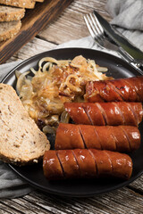 Fried sausage with onion.