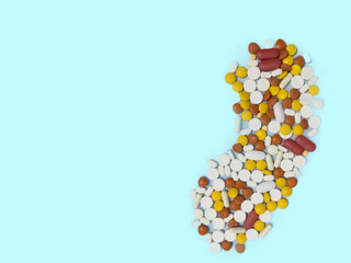 Stomach shaped Tablets arranged on blue background with Selective Focus , copy space