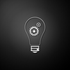 Silver Light bulb and gear inside icon isolated on black background. Innovation concept. Long shadow style. Vector.
