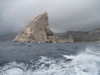 Panoramic view of Mediterranean Sea in storm. Beautiful power blue and white waves on a rainy day.