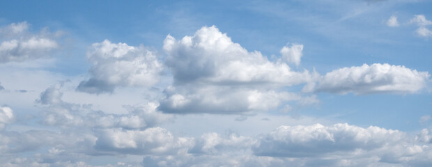 Summer blue sky with clouds in the open air. Background. Billboard. Panorama