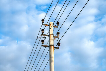 Electricity pole against blue sky background, High voltage electricity pylon