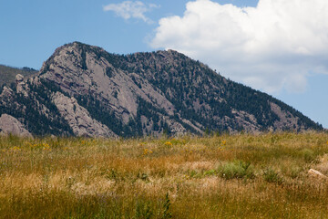 Mountain with stones against a sky