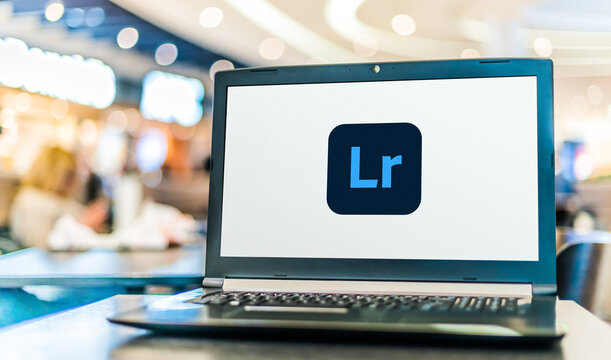 Laptop computer displaying logo of Adobe Lightroom