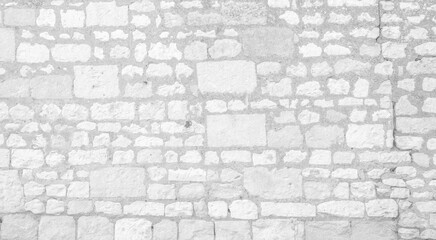 White texture of an old wall made of hewn stones - old vintage texture design - large image in high resolution	