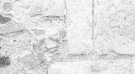 White texture of an old wall with some carved exposed stones - old vintage texture design - large image in high resolution