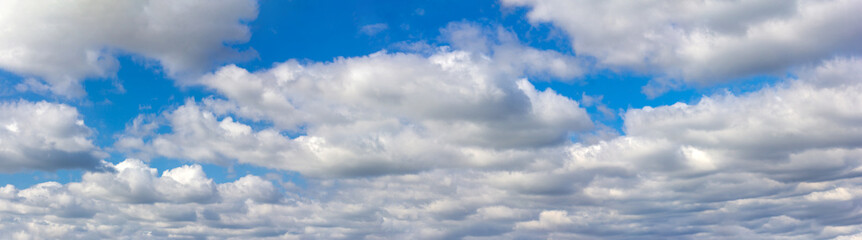 Naklejka na ściany i meble Panorama blue sky and white clouds.