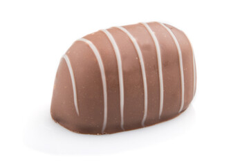 Single chocolate candy isolated on white background. side view.