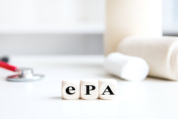 Medical office background with dice, word ePA, which means german elektronische Patientenakte