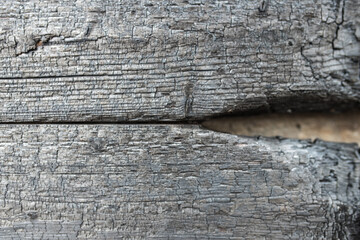 Burnt wood planks, black and white background of burnt boards.