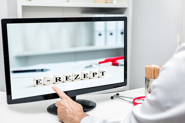 Doctor in the practice touching monitor, word e-rezept on dices, german elektronisches rezept - obrazy, fototapety, plakaty