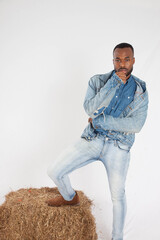 Pensive Black man in a blue jean jacket