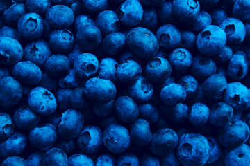 Blurry image of blueberries. Berries background. Abstract food background.