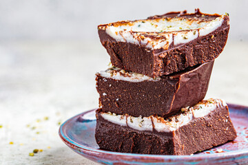 Raw vegan chocolate bars, copy space. Healthy sugar-free dessert.