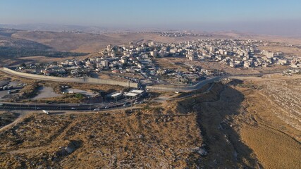Fototapeta na wymiar Palestine Hizma Town with Idf Military Checkpoint,Aerial view Security tower at Hizma Town Checkpoint in North Jerusalem 