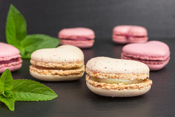 heart shaped macaroons  in pink and pale yellow with mint