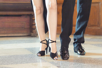 Legs of man and woman dancing Argentine tango