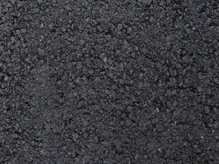 Dark texture of fresh and clean asphalt