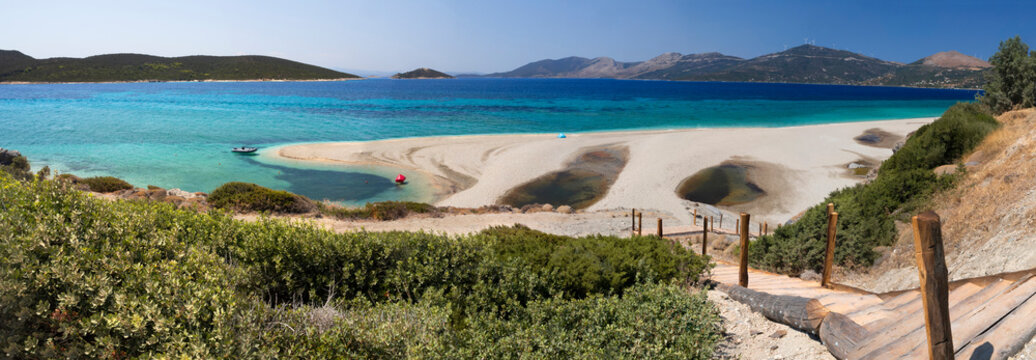 View of a Grand sandy beach in the Aegean sea on the Greek island of Evia in Greece