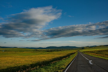Russia. Republic Of Khakasia. Endless steppes among picturesque hilly mountains near the village of Shira.