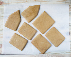 How to make gingerbread house, step by step, tutorial. Step 5. Baking parts of gingerbread house.