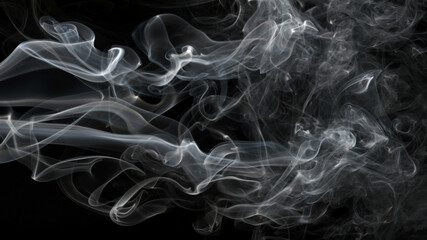 Smoke isolated on black background. Movement of white smoke