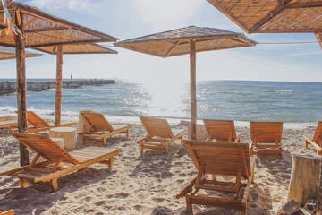 beach chairs and umbrella