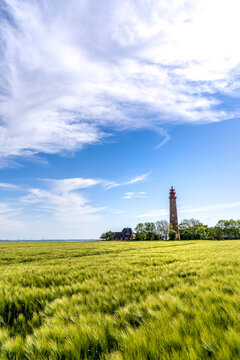 The beautiful Lighthouse Of Fl&uuml;gge On The Isle Of Fehmarn at the Baltic Sea in Germany. Summer in Germany.
