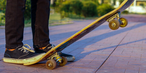 Man's leg on the skate board