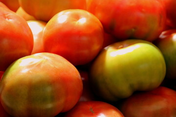 Tomatoes close up on the market stall