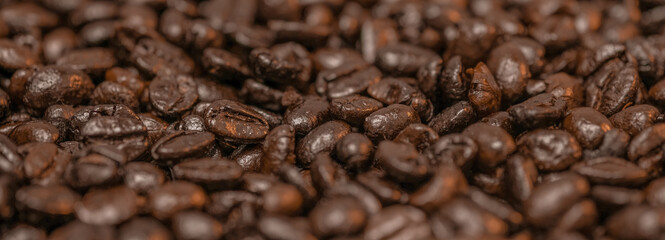 Roasted coffee beans background, can be used as a background. Close Up.