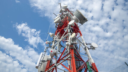 clouds passing radio tower