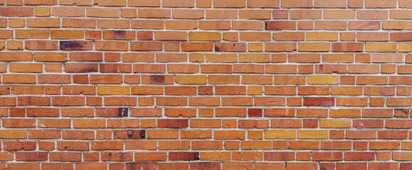 background of old red brick wall. Texture of grunge brickwork