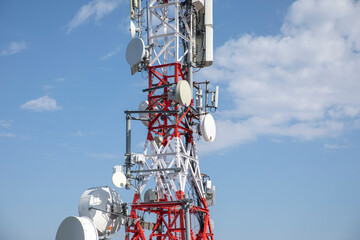 clouds passing radio tower