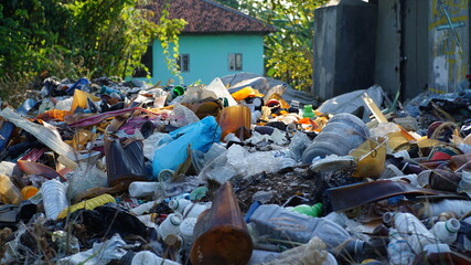 Mountain of garbage near someone house