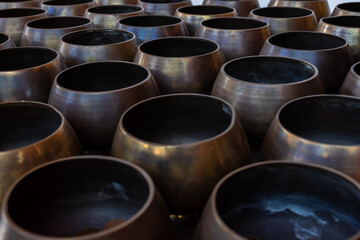 A pile of old metal pots