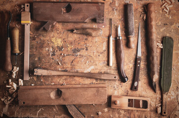 Hand tools Wood on an old wooden workbench