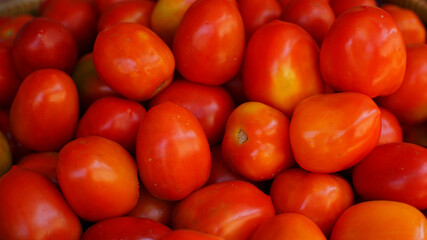 Group of fresh tomattoes at traditional market
