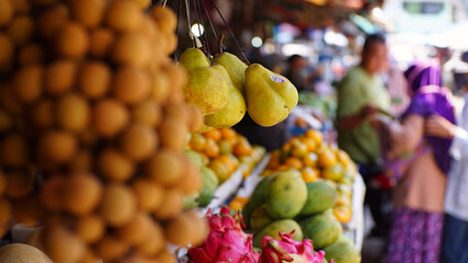 Pear hanging at the shop, fruit store with blurred