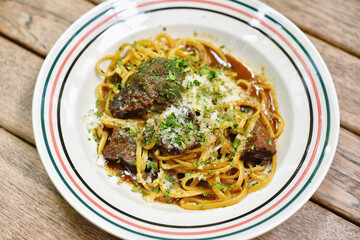 Spaghetti with beef stroganoff, Homemade pasta and slow cooked veal stew, Favorite italian dish in restaurant.