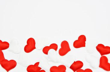 Red and white hearts on a white background