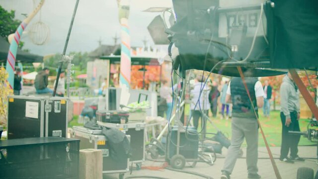 Blurred film set equipment and crew